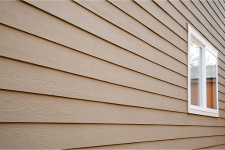 Why Faded, Warped, or Loose Siding Shouldn't Be Ignored